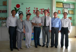 Gary Young and Sue Chao meeting with officials from the Ningxia Red wolfberry facility