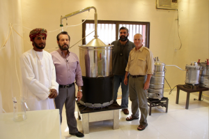 Mr. Abdullah Hamden, Gary Young, Mahmoud Suhail, M.D. and Cole Woolley at the Young Living distillery