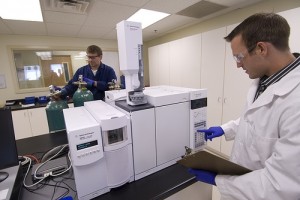 A lab technician checks the GC-MS instrument in the Spanish Fork, Utah, laboratory