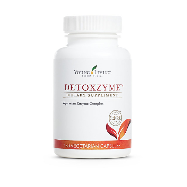 a white bottle of Young Living's Detoxzyme Dietary Supplement