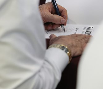 Gary-Signing-Raindrop-Book