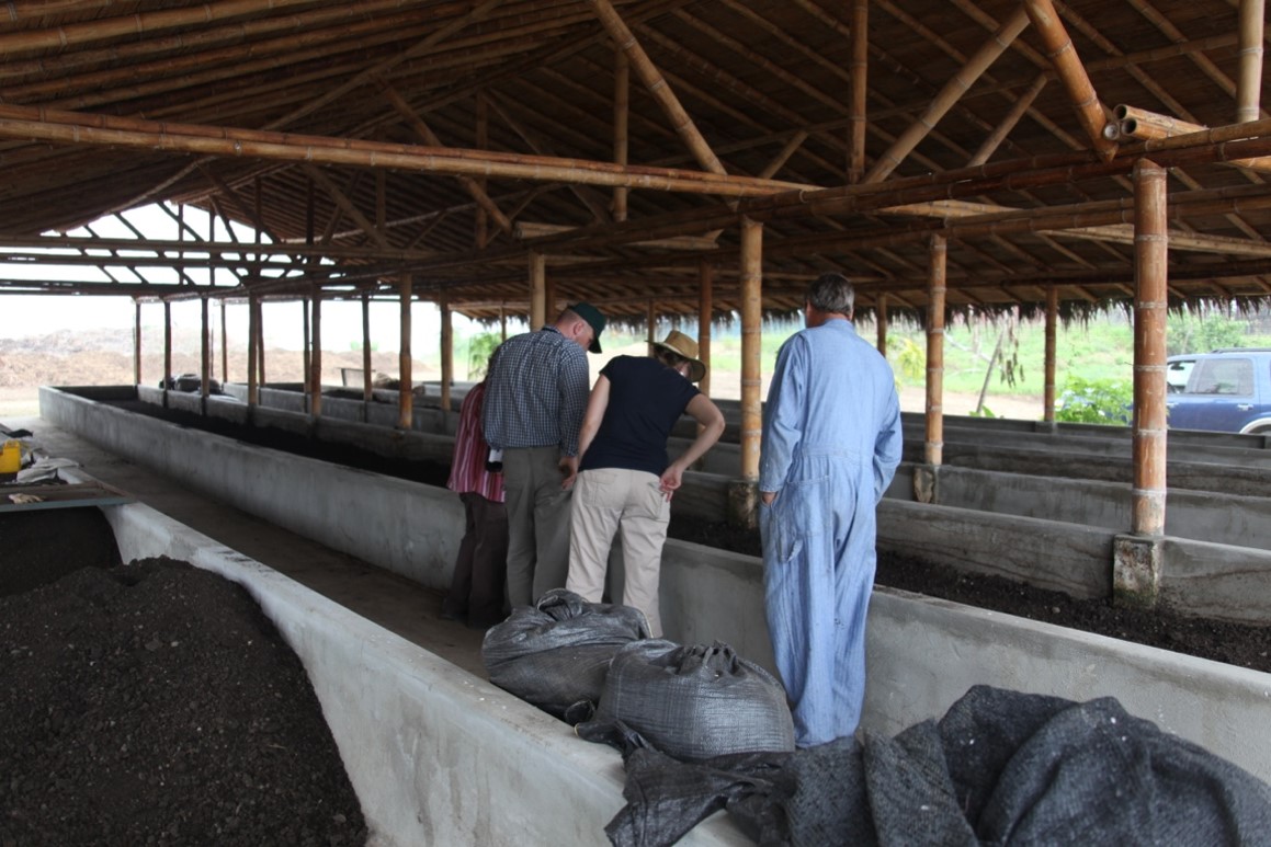 Visitors are viewing one of Young Living’s six large worm houses in Ecuador.