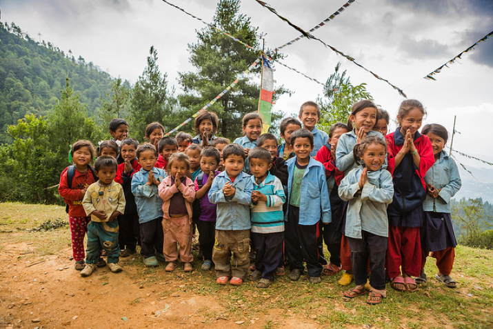 The beautiful children of Yarsa, Nepal, show the traditional Hindu greeting “Namaste,” which means, “I bow to the divine in you.”