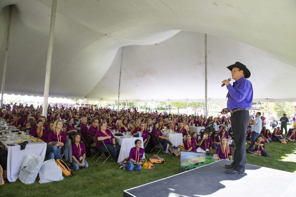 Gary Young speaking to a crowd of Young Living members.